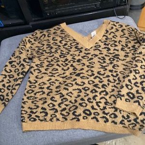 Woman’s leopard print sweater